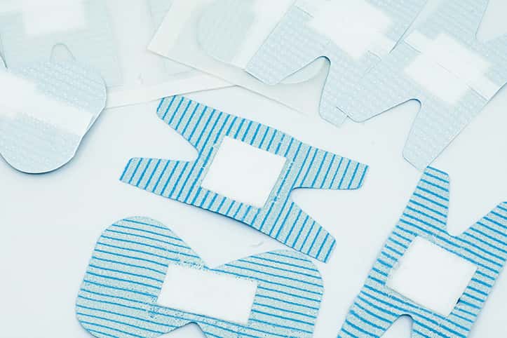 Blue detectable dressings